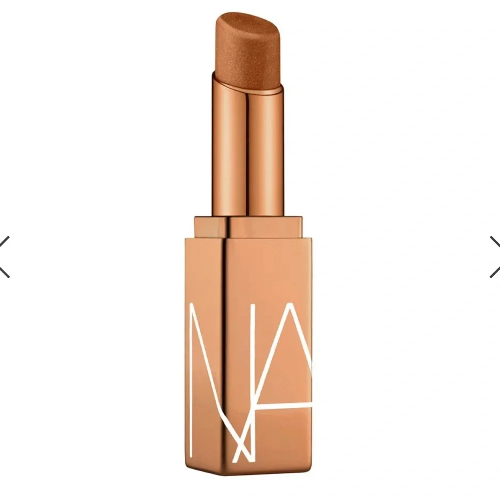 NARS Afterglow Lip Balm in Laguna, a sheer bronze with gold shimmer